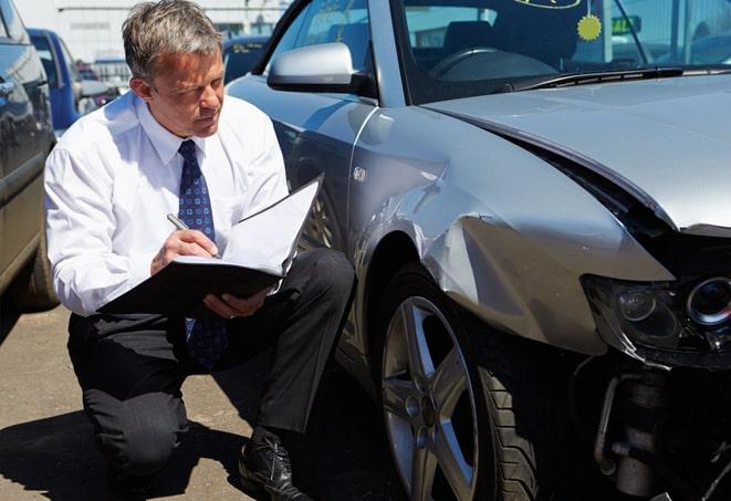 couple reviewing their car insurance coverage